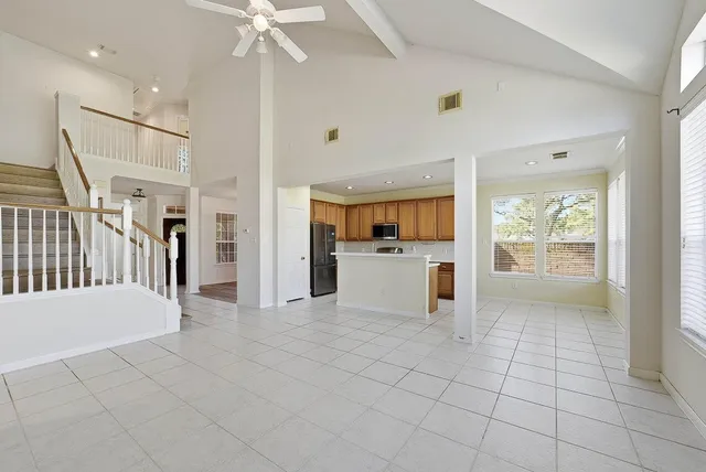 a view of kitchen with furniture and window