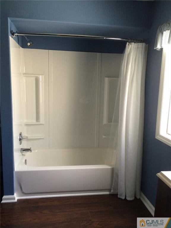 39 Poe Road, Unit 39 North Brunswick, NJ 08902 - Photo 15 of 21 a bathroom with bathtub and shower