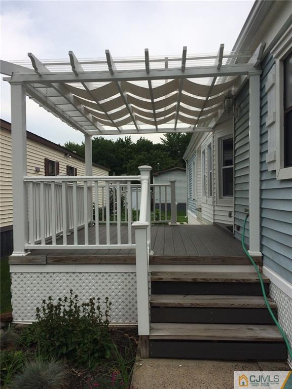 39 Poe Road, Unit 39 North Brunswick, NJ 08902 - Photo 4 of 21 a view of outdoor space with seating area