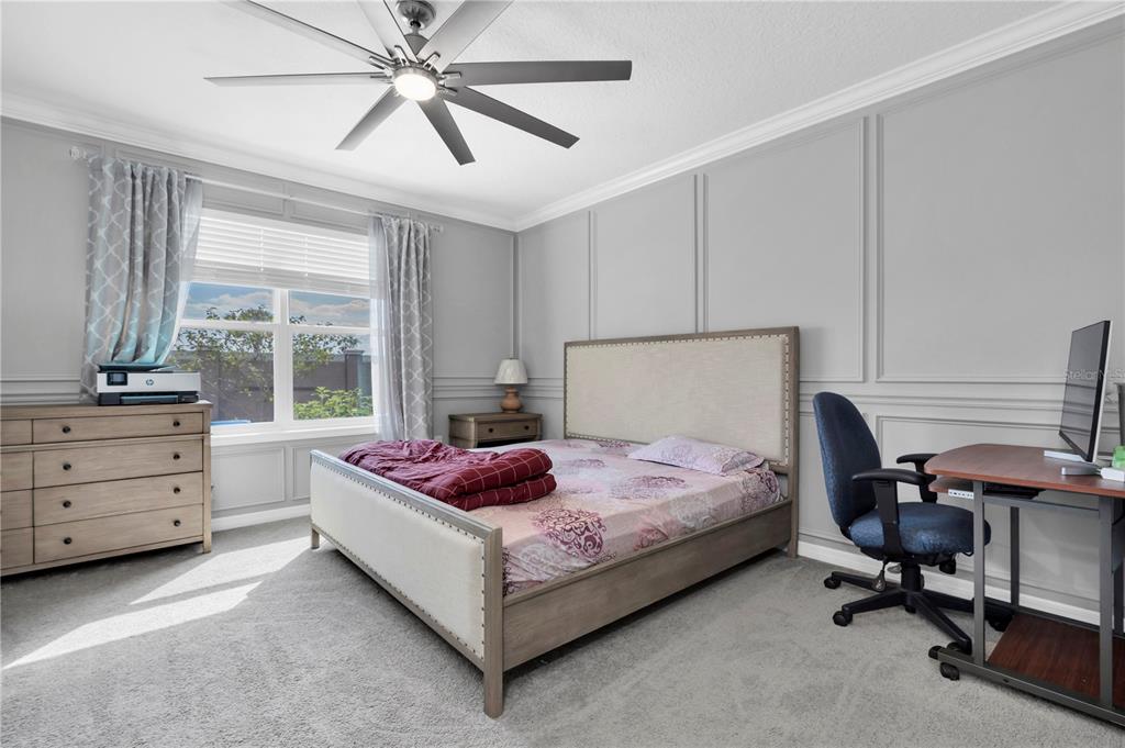 31130 Penny Surf Loop Wesley Chapel, FL 33545 - Photo 14 of 42 a bedroom with a bed and a window