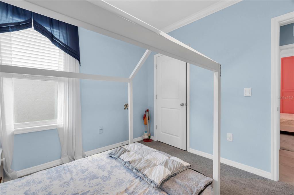 31130 Penny Surf Loop Wesley Chapel, FL 33545 - Photo 20 of 42 a view of a livingroom with wooden floor and closet