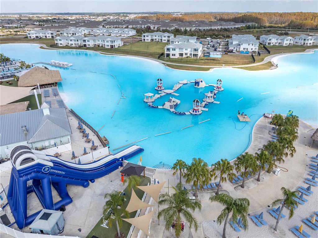 31130 Penny Surf Loop Wesley Chapel, FL 33545 - Photo 40 of 42 an aerial view of a house with a lake view