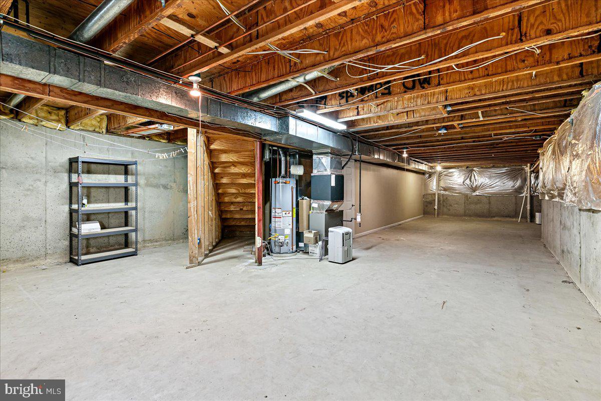 8307 Southstream Run Springfield, VA 22153 - Photo 40 of 49 a view of empty room with wooden ceiling