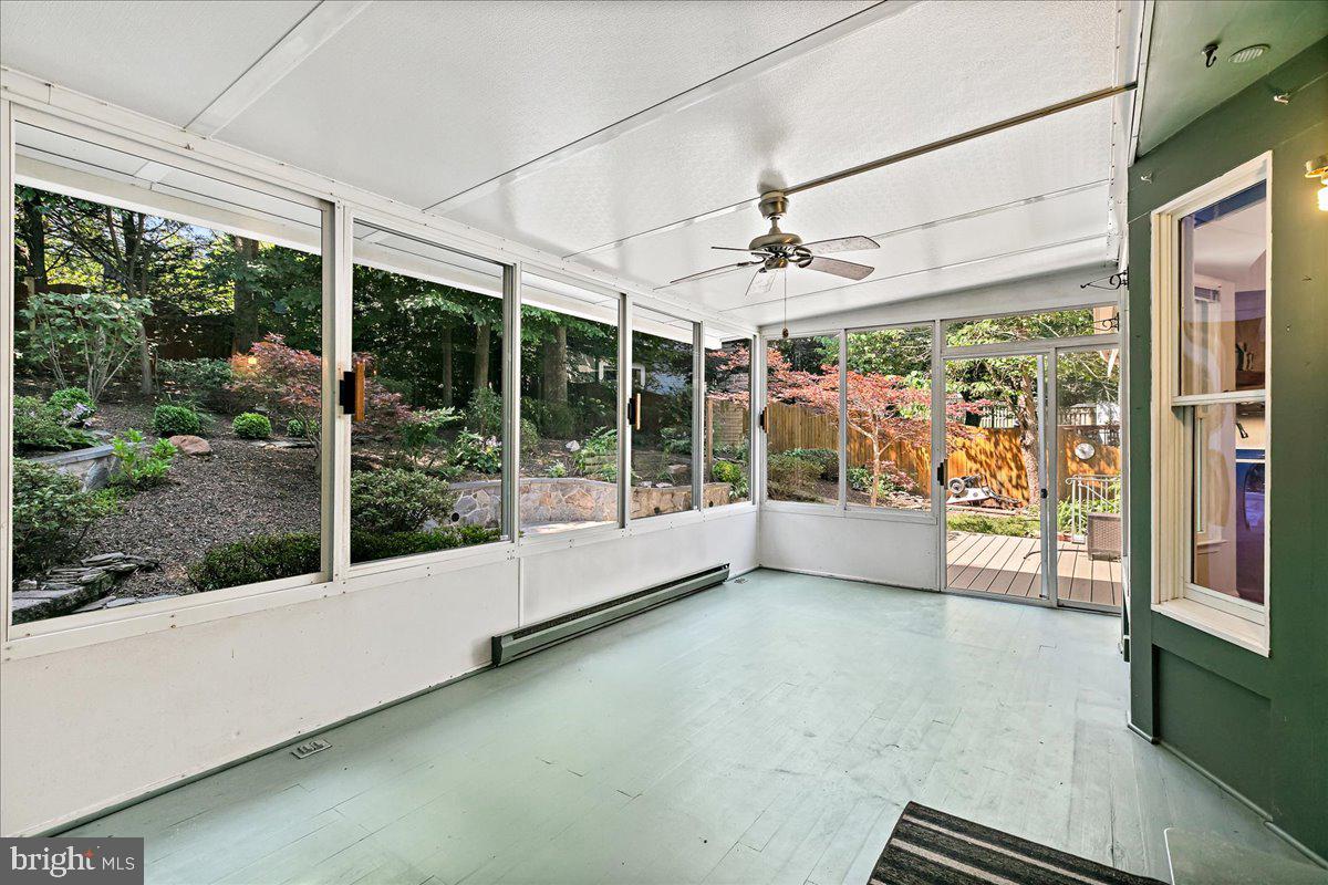 8307 Southstream Run Springfield, VA 22153 - Photo 41 of 49 a view of an empty room with a large window