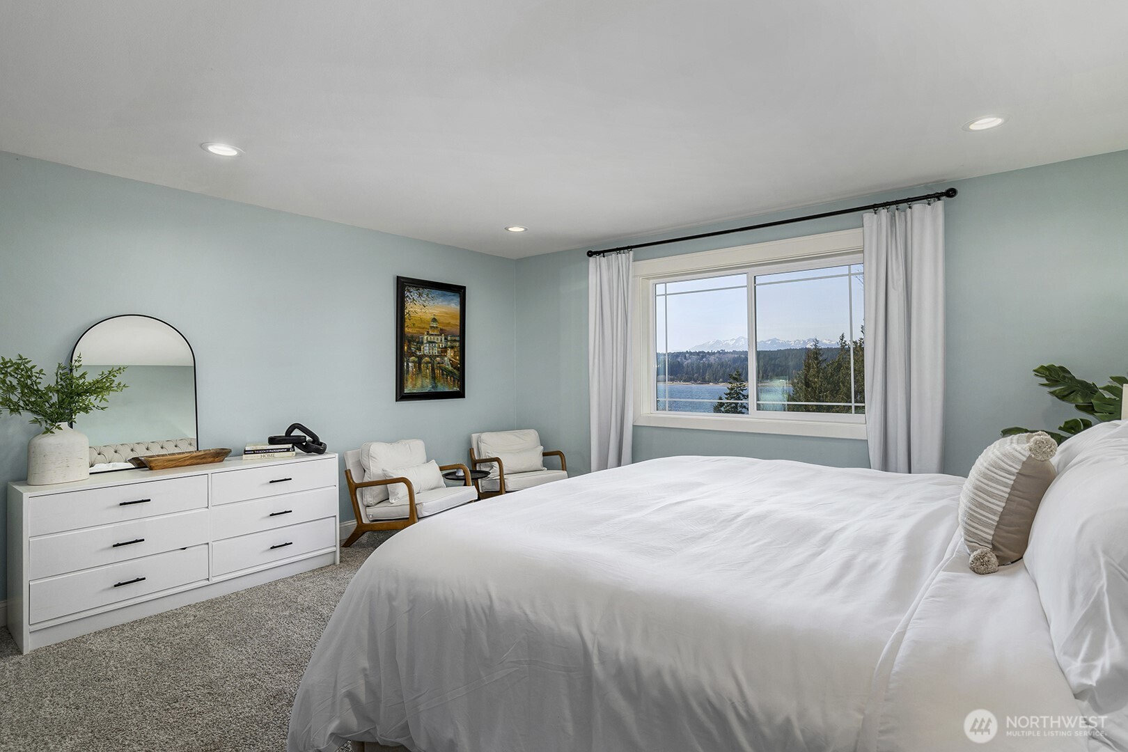 31 East Cove View Drive Belfair, WA 98528 - Photo 11 of 23 a bedroom with a bed and a dresser