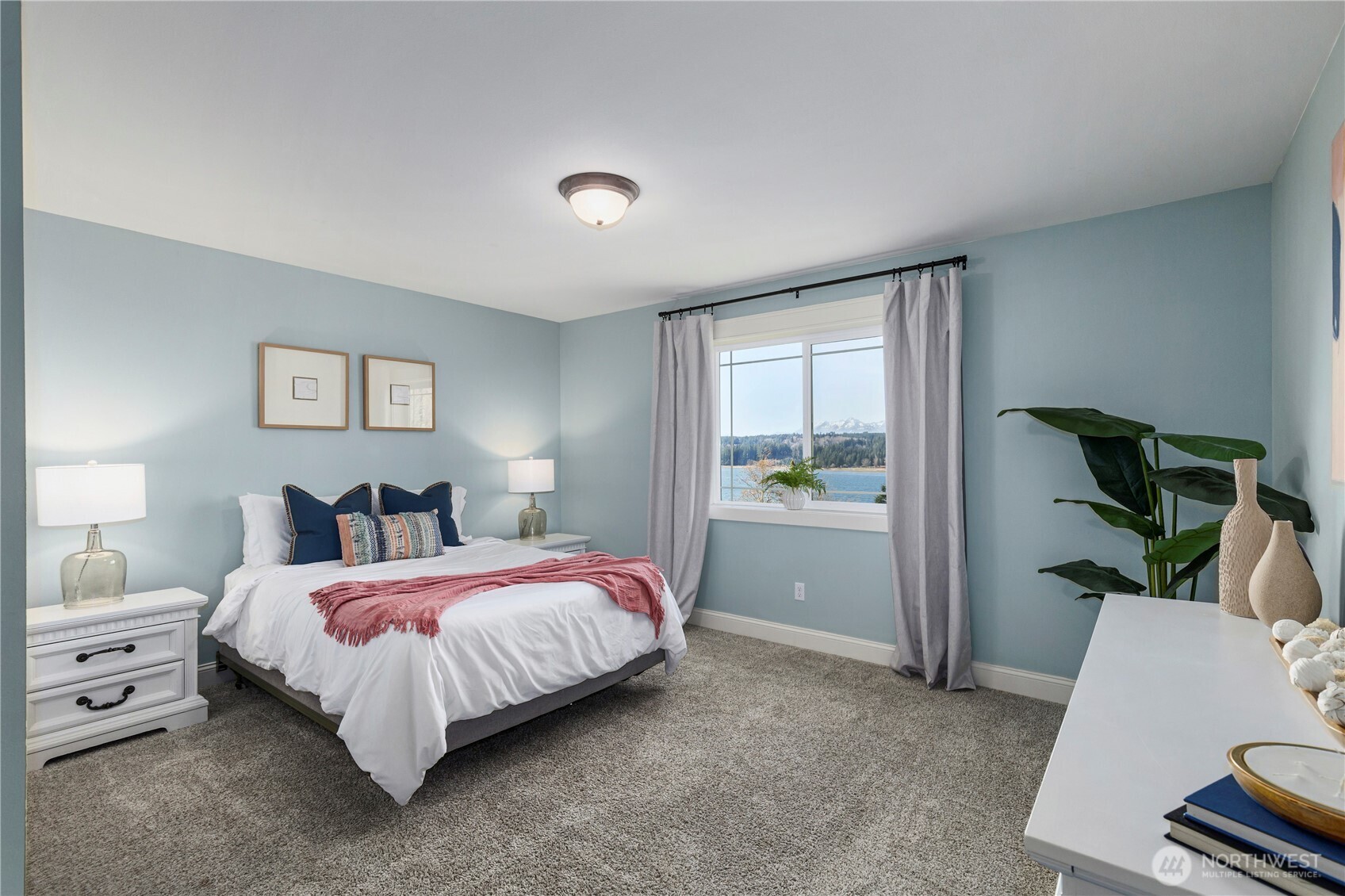 31 East Cove View Drive Belfair, WA 98528 - Photo 12 of 23 a bedroom with a bed and a window