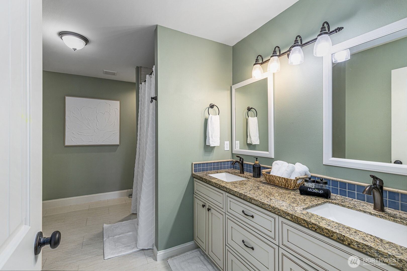 31 East Cove View Drive Belfair, WA 98528 - Photo 14 of 23 a bathroom with a granite countertop double vanity sink and mirror