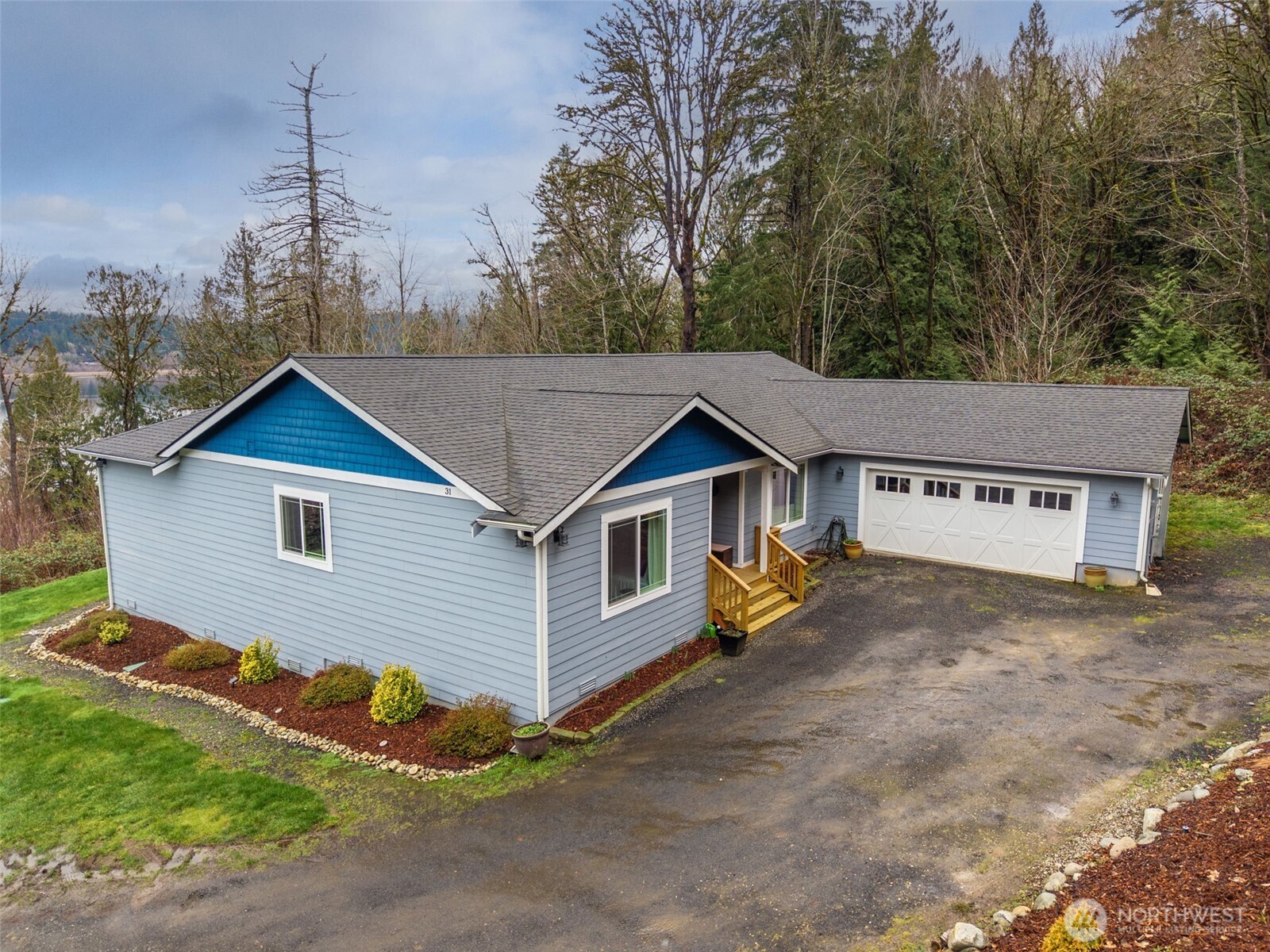 31 East Cove View Drive Belfair, WA 98528 - Photo 6 of 23 a view of house and outdoor space