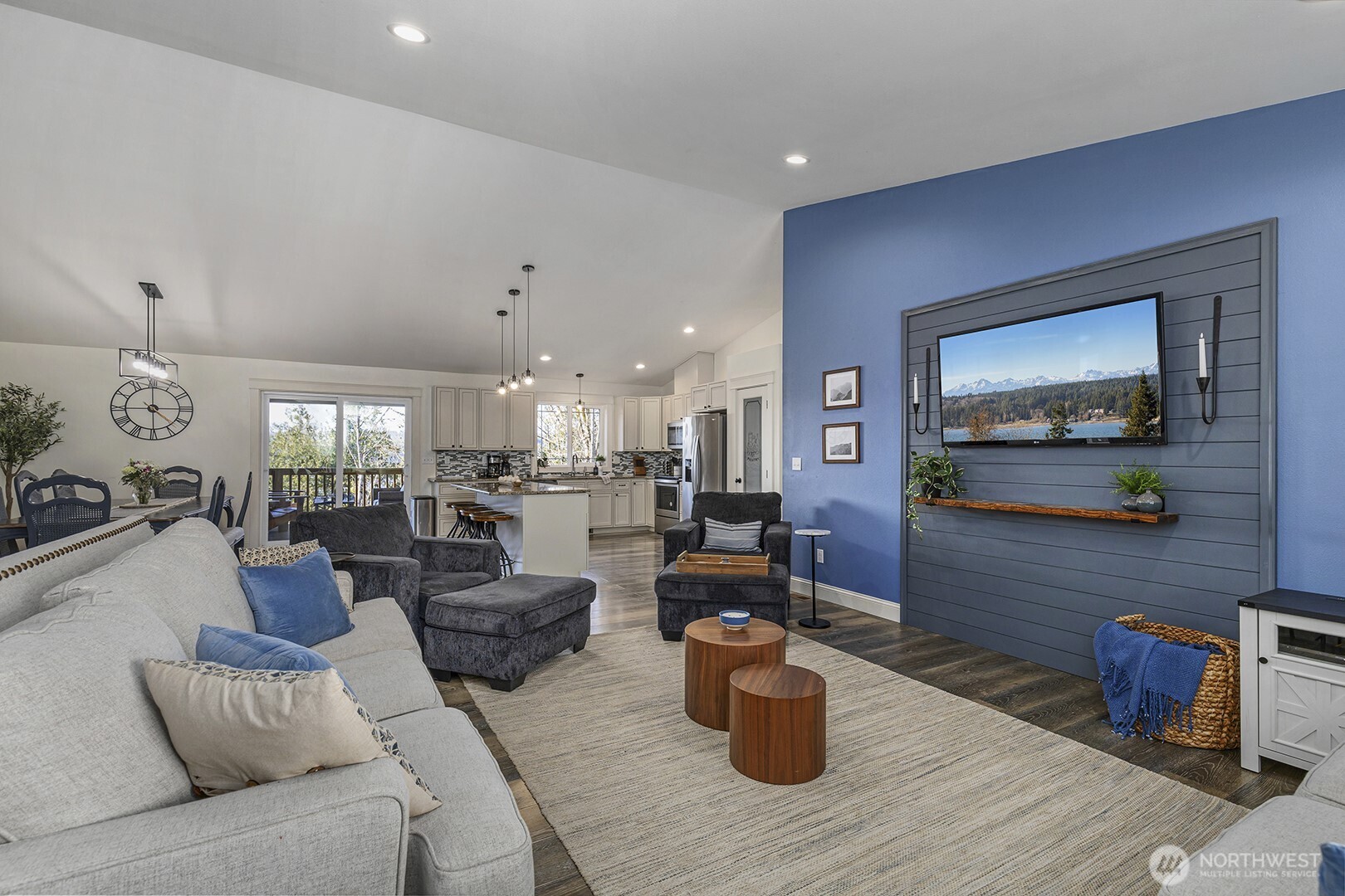 31 East Cove View Drive Belfair, WA 98528 - Photo 10 of 23 a living room with furniture and a flat screen tv
