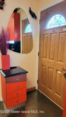 a outdoor dining space with furniture and a potted plant