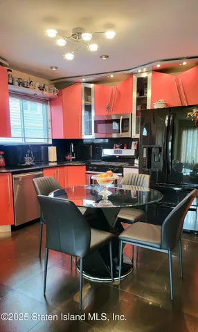 a bed room with a bed and two night stand