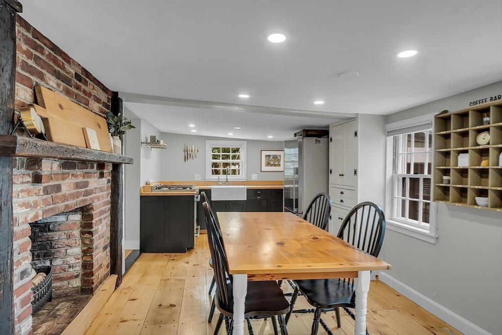 16 River Street Salem, MA 01970 - Photo 12 of 37 a view of a a dining room with furniture window and wooden floor