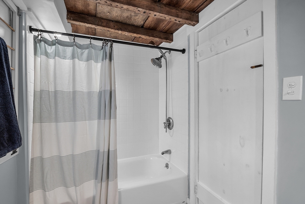 16 River Street Salem, MA 01970 - Photo 18 of 37 a bathroom with a shower