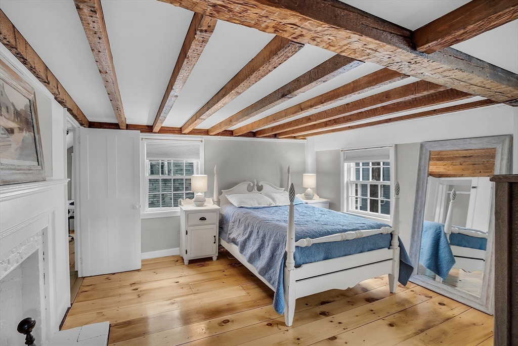 16 River Street Salem, MA 01970 - Photo 23 of 37 a bedroom with a large bed and a window