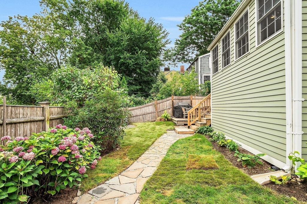 16 River Street Salem, MA 01970 - Photo 33 of 37 a garden view with a seating space