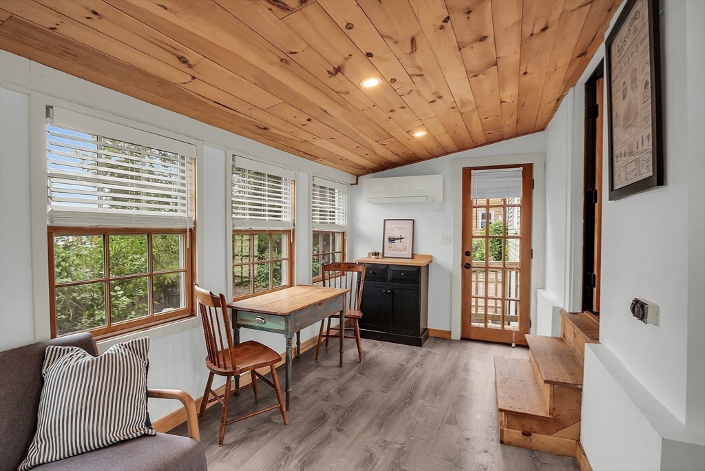 16 River Street Salem, MA 01970 - Photo 4 of 37 a view of a livingroom with furniture and a window