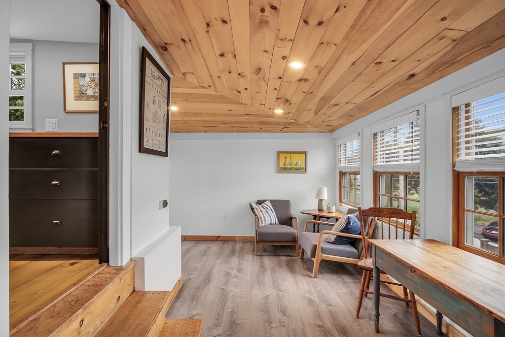 16 River Street Salem, MA 01970 - Photo 6 of 37 a living room with furniture and a wooden floor