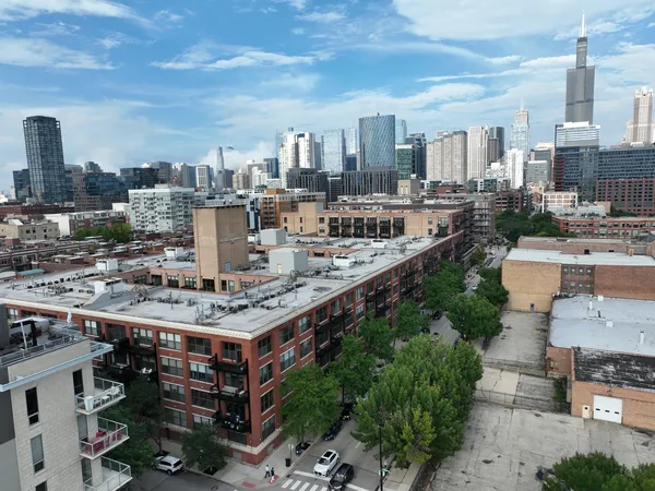 a large building with a city view