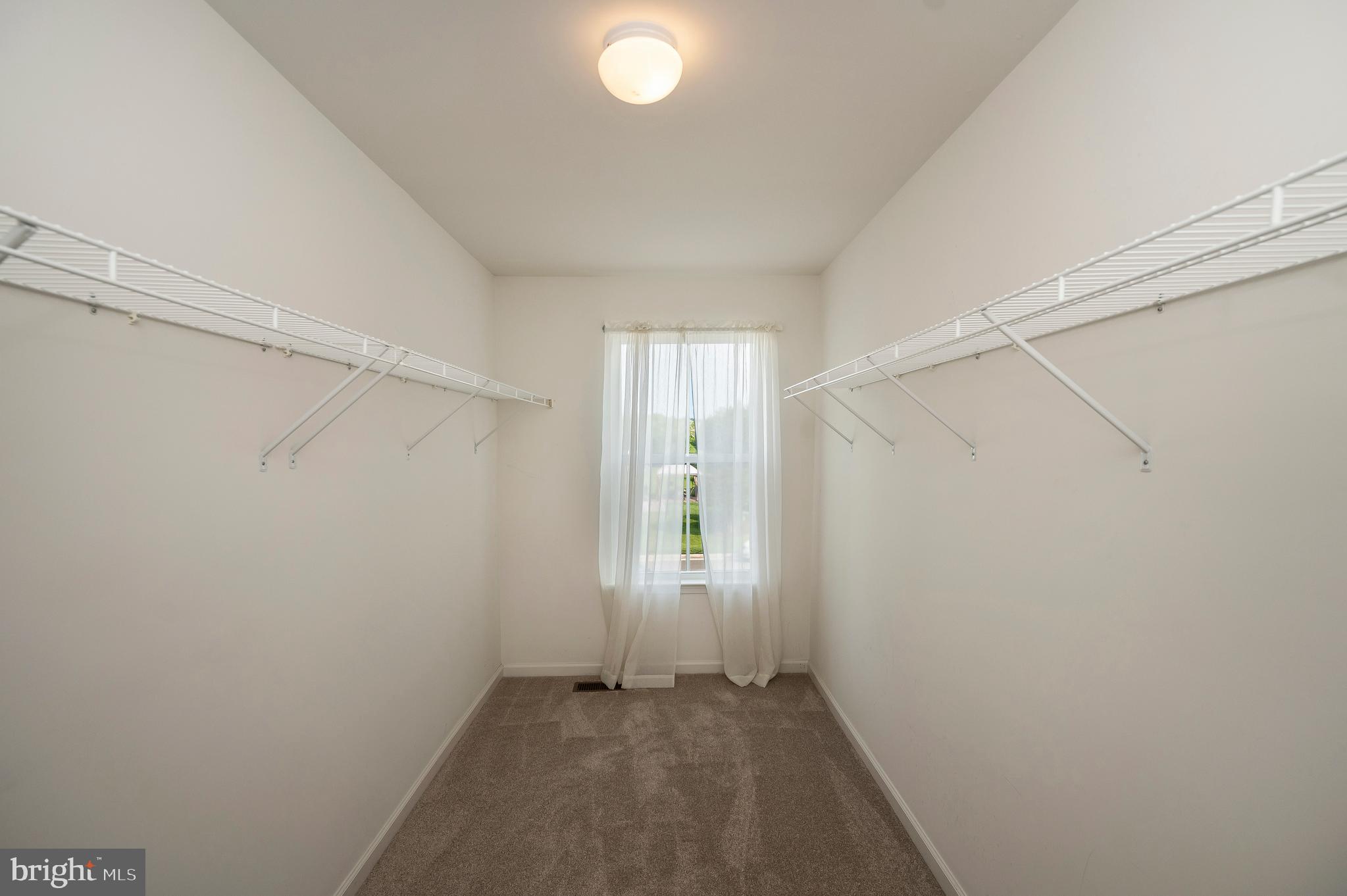 3308 Boathouse Road Warrenton, VA 20187 - Photo 27 of 59 a view of an empty room with windows