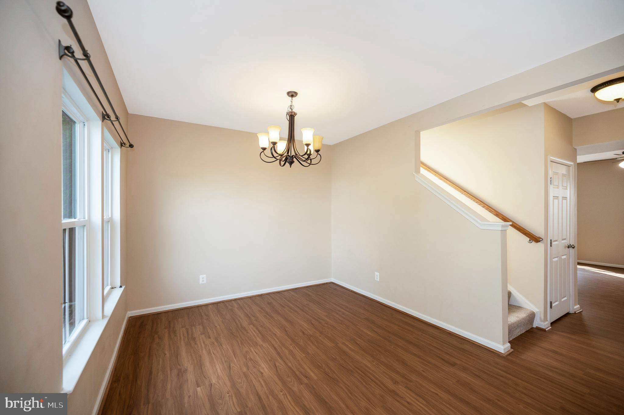 3308 Boathouse Road Warrenton, VA 20187 - Photo 3 of 59 wooden floor in an empty room with a window