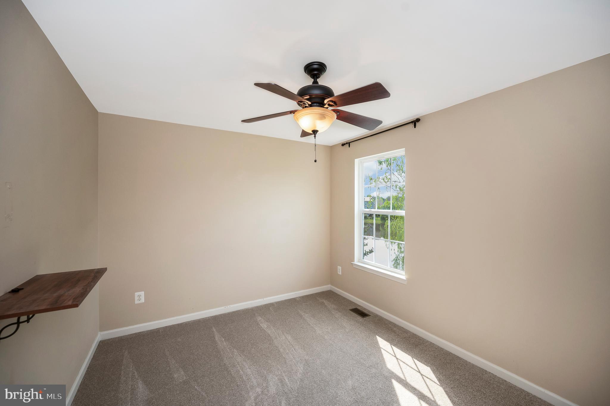 3308 Boathouse Road Warrenton, VA 20187 - Photo 35 of 59 a view of an empty room with a window