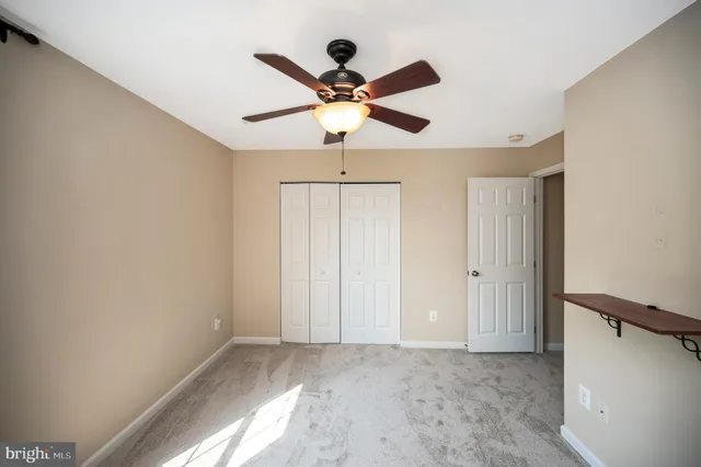 a bathroom with a shower and a toilet
