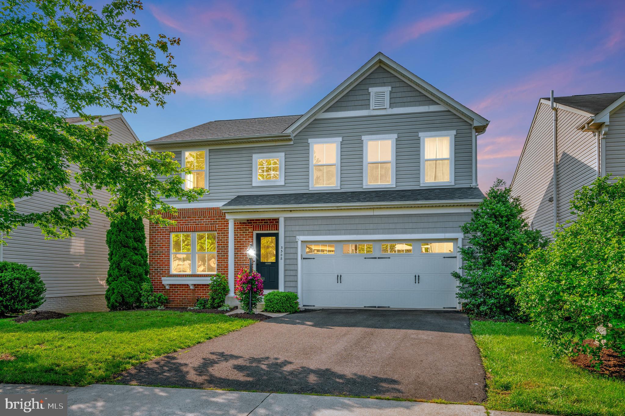 3308 Boathouse Road Warrenton, VA 20187 - Photo 45 of 59 a front view of a house with a yard and garage