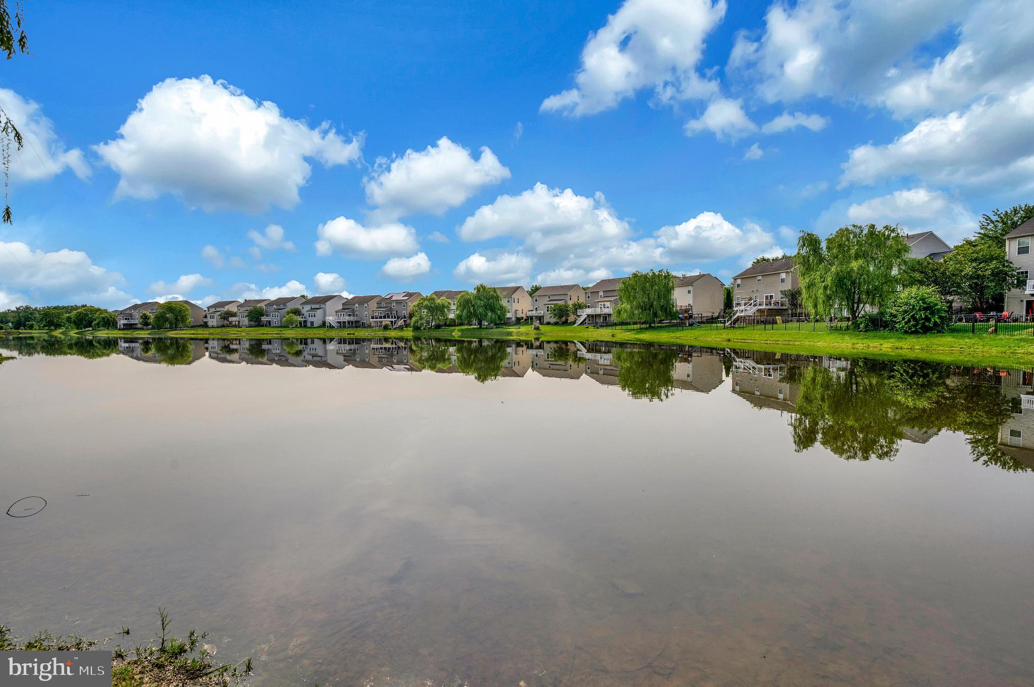 3308 Boathouse Road Warrenton, VA 20187 - Photo 52 of 59 a view of a lake with houses in the back