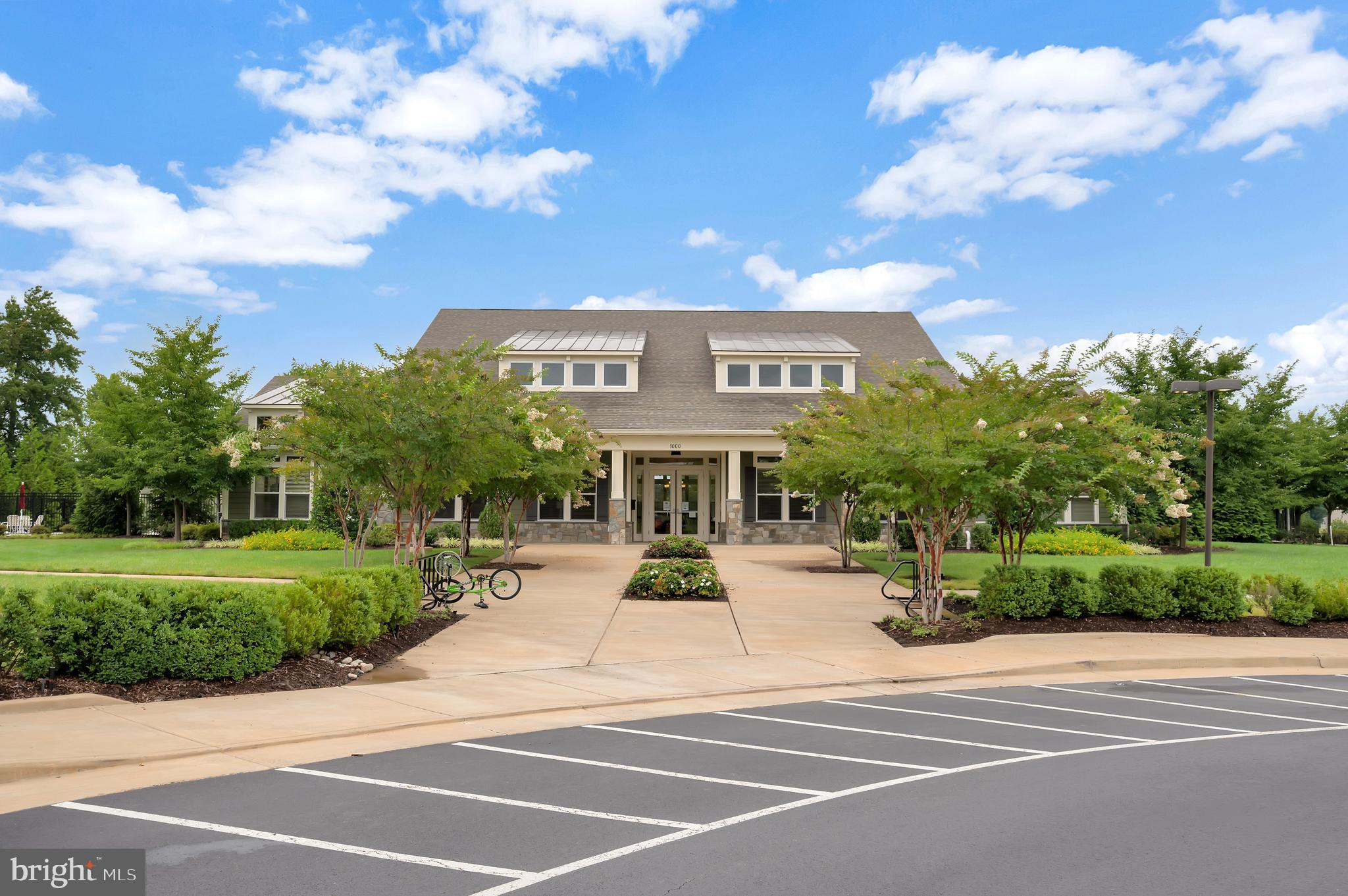 3308 Boathouse Road Warrenton, VA 20187 - Photo 55 of 59 a view of a building with a yard