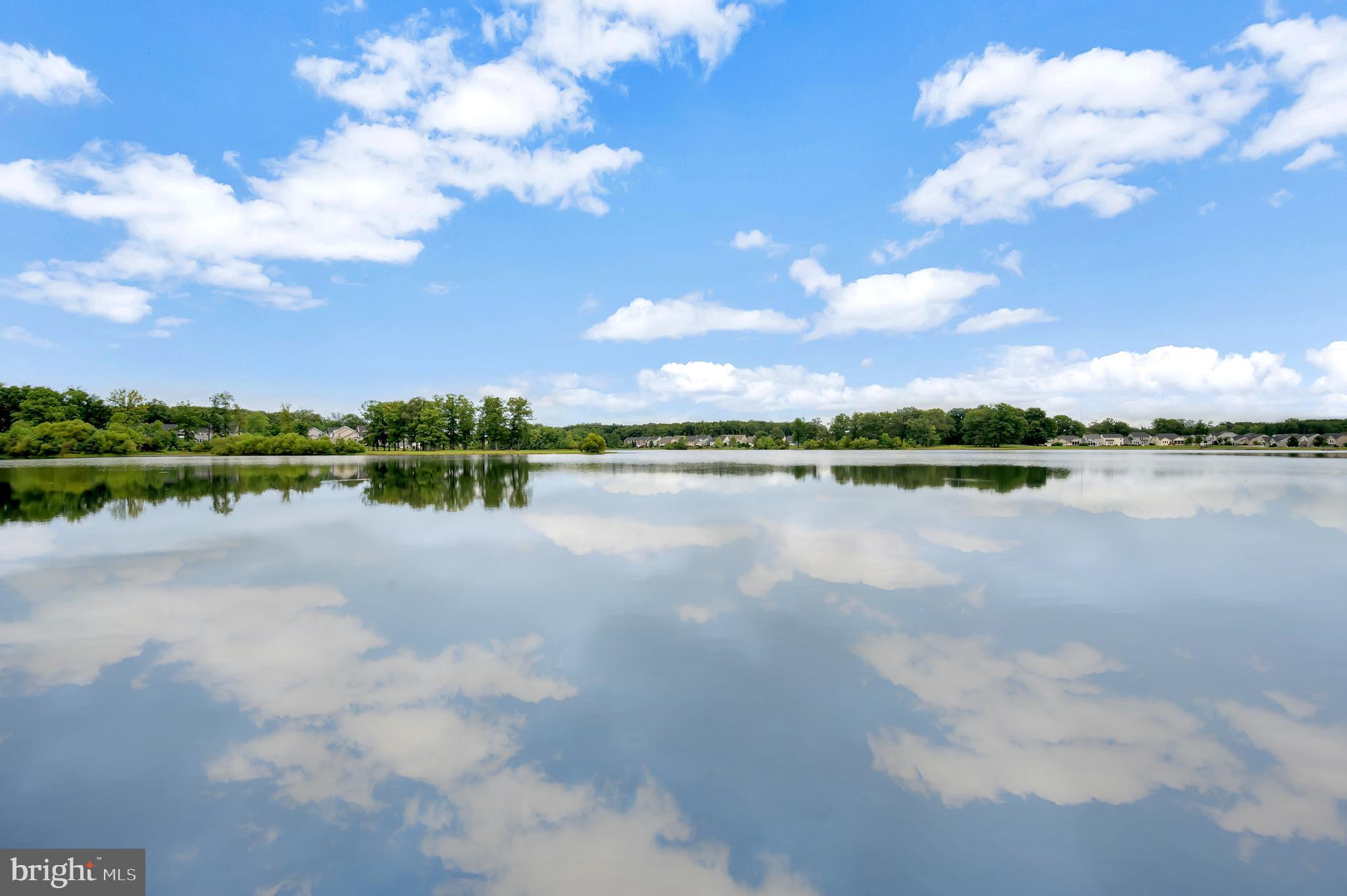 3308 Boathouse Road Warrenton, VA 20187 - Photo 58 of 59 a view of a lake with houses in the background