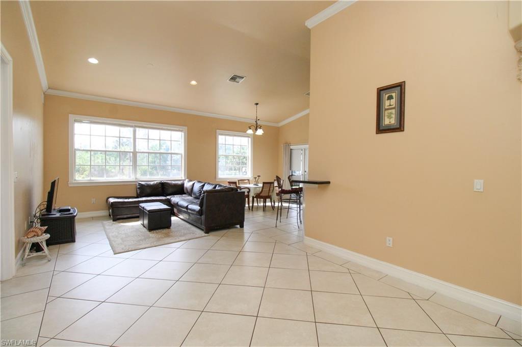 2310 2nd Avenue Southeast Naples, FL 34117 - Photo 6 of 43 a large room with a large window