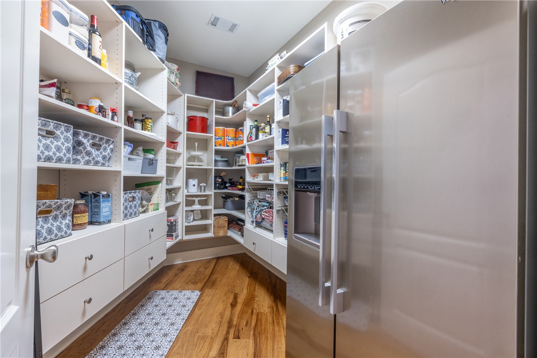 209 Crestridge Drive Seneca, SC 29672 - Photo 18 of 49 This spacious pantry provides abundant storage and organization solutions for any culinary enthusiast.