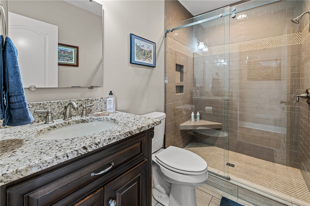 209 Crestridge Drive Seneca, SC 29672 - Photo 27 of 49 This thoughtfully designed bathroom features a spacious shower and elegant vanity for daily rejuvenation.