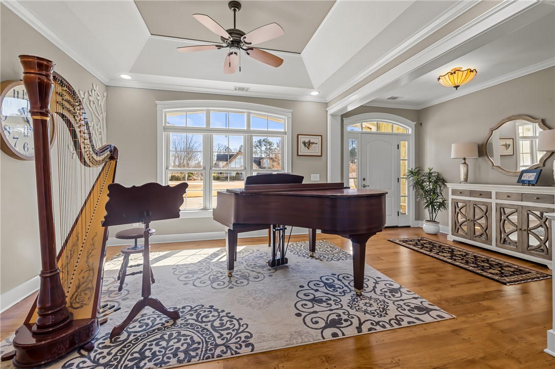 209 Crestridge Drive Seneca, SC 29672 - Photo 3 of 49 This versatile living area showcases elegant hardwood flooring and a bright entryway.