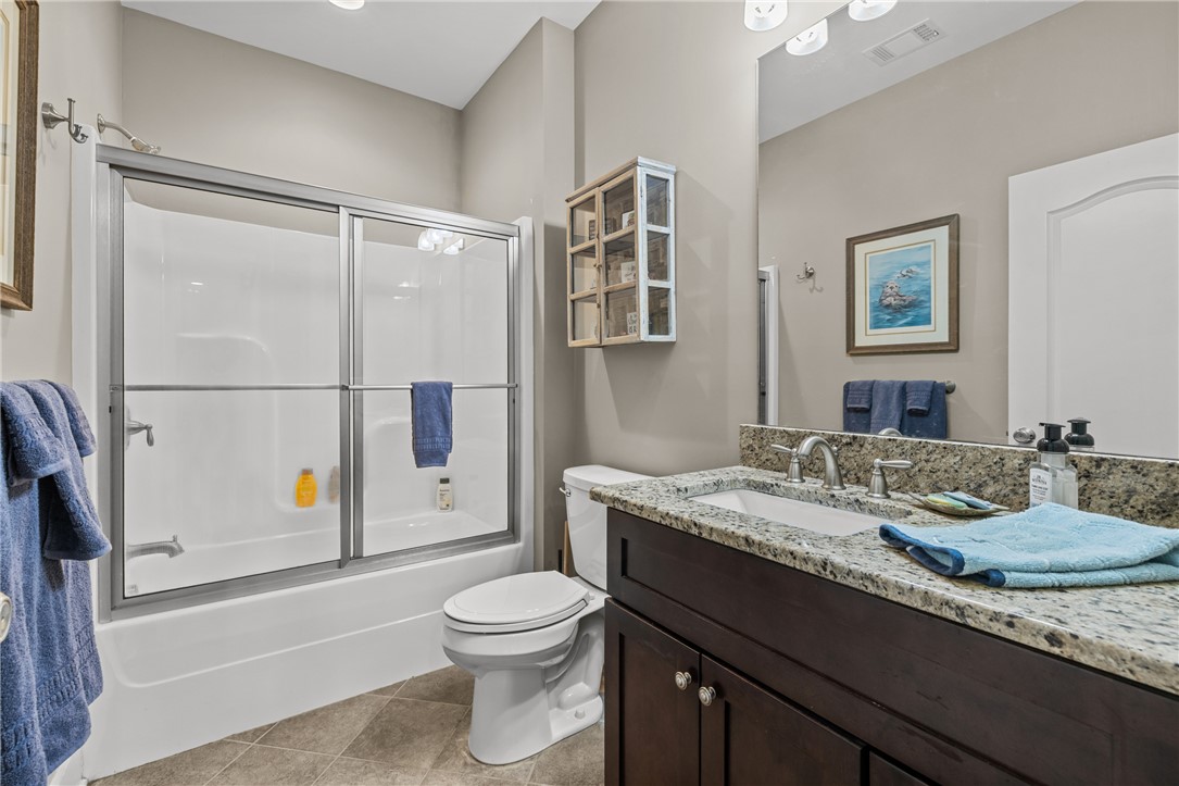 209 Crestridge Drive Seneca, SC 29672 - Photo 36 of 49 This refreshing bathroom features a sleek vanity and a combination shower and tub.