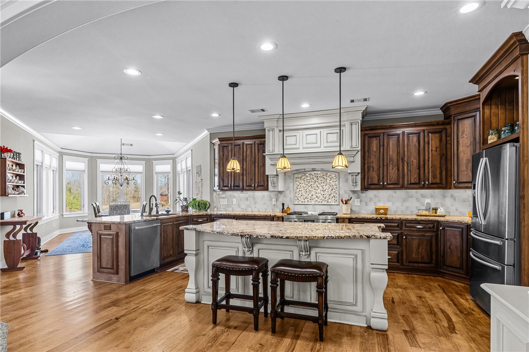 209 Crestridge Drive Seneca, SC 29672 - Photo 49 of 49 This spacious kitchen offers ample counter space and an open floor plan ideal for entertaining.