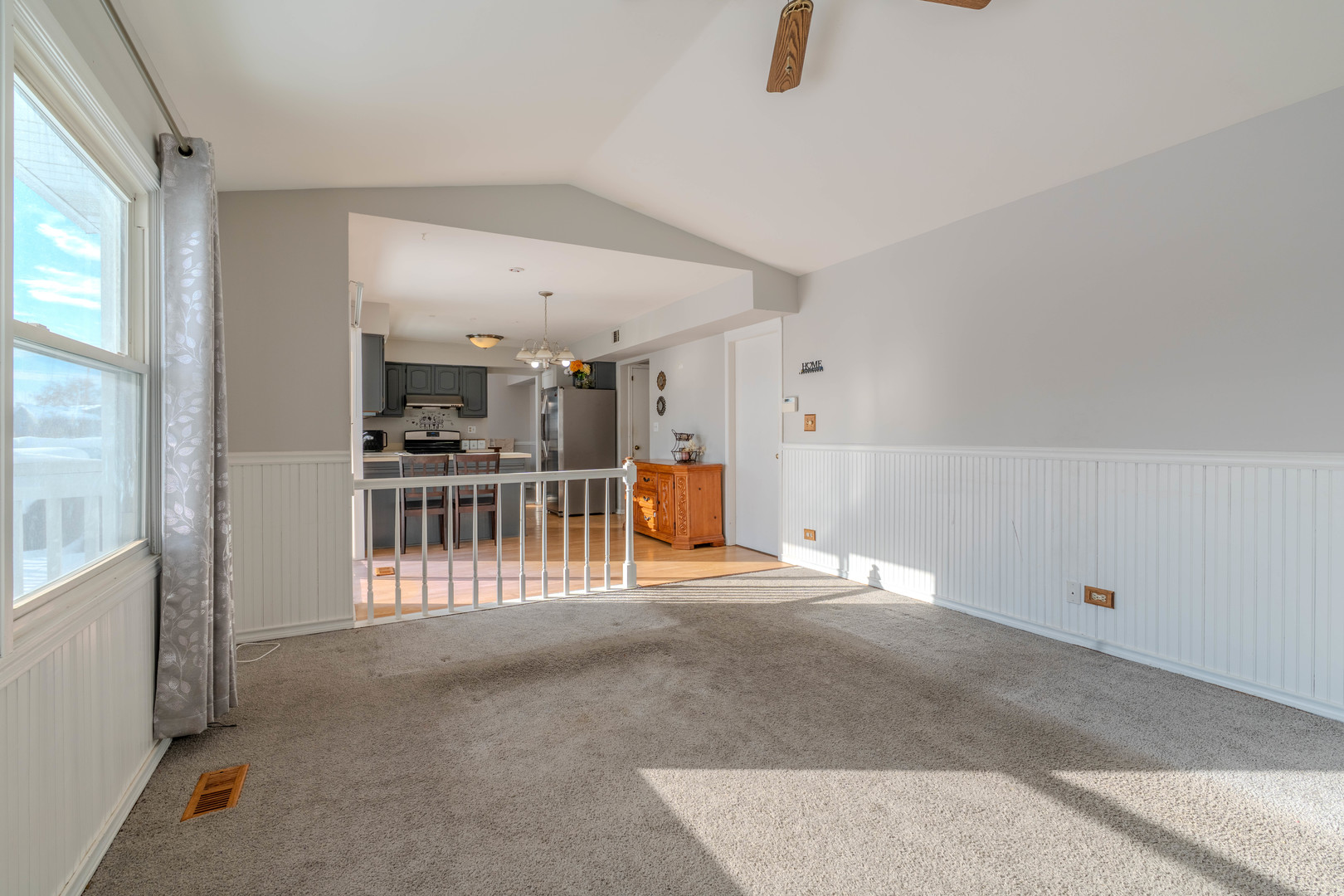 601 Bluff Street Carol Stream, IL 60188 - Photo 12 of 25 a view of a livingroom with a staircase