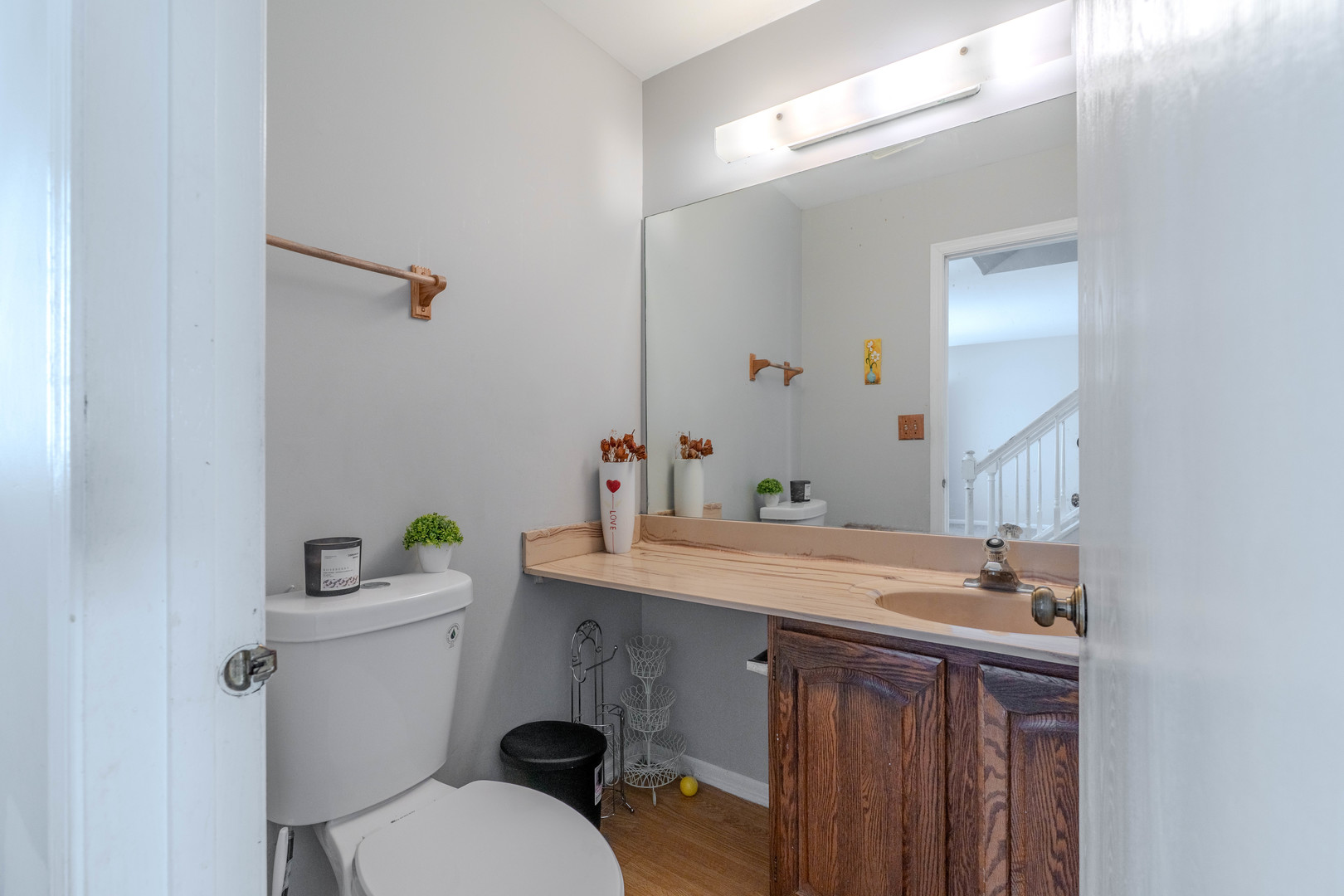 601 Bluff Street Carol Stream, IL 60188 - Photo 15 of 25 a bathroom with a sink vanity mirror and toilet