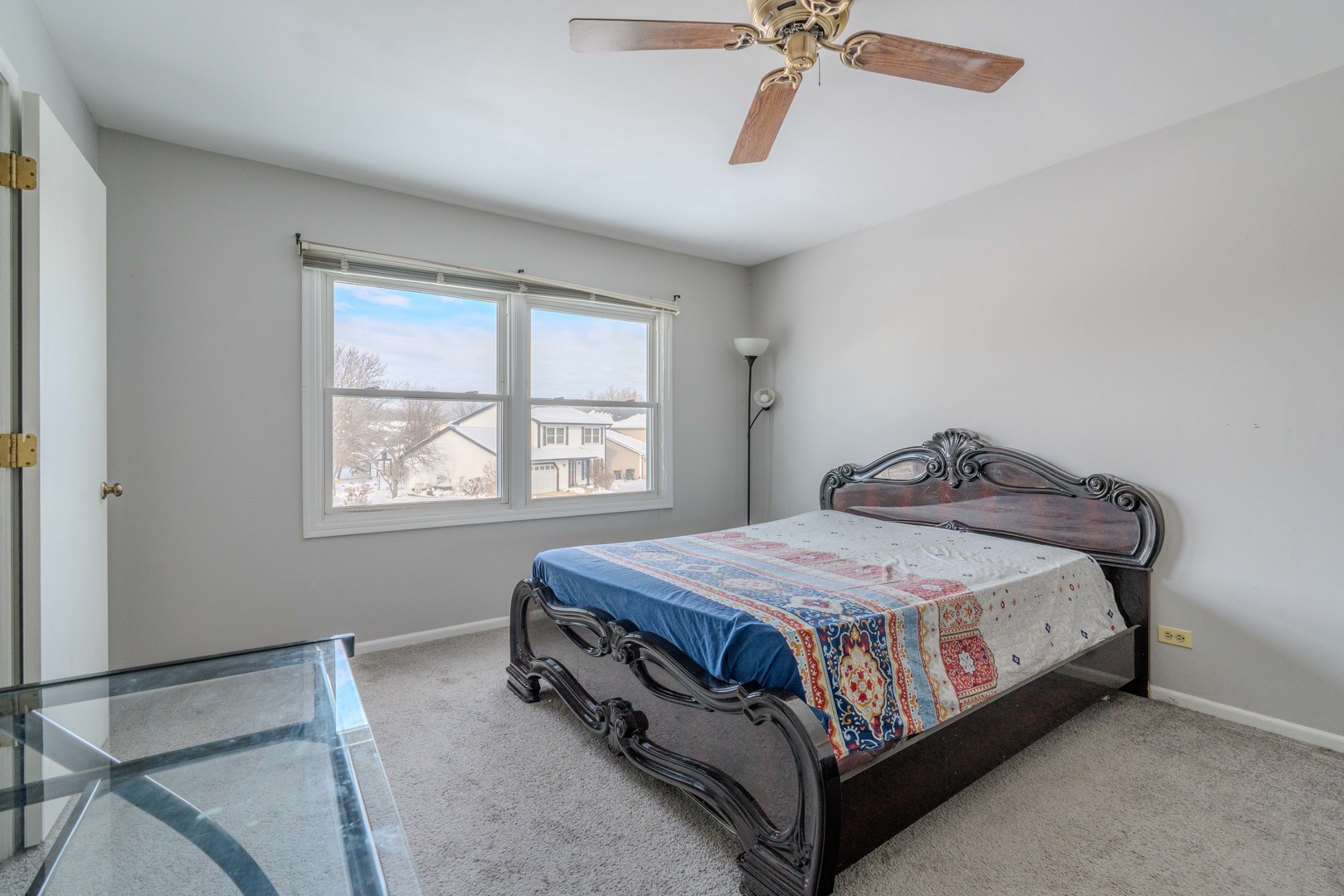 601 Bluff Street Carol Stream, IL 60188 - Photo 23 of 25 a bedroom with a bed and window