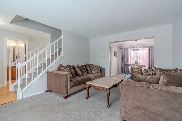 a living room with furniture and a couch