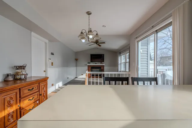 a living room with furniture and flat screen tv