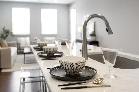 a kitchen with a sink stove and refrigerator