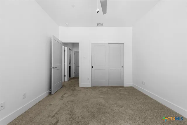 an empty room with closet