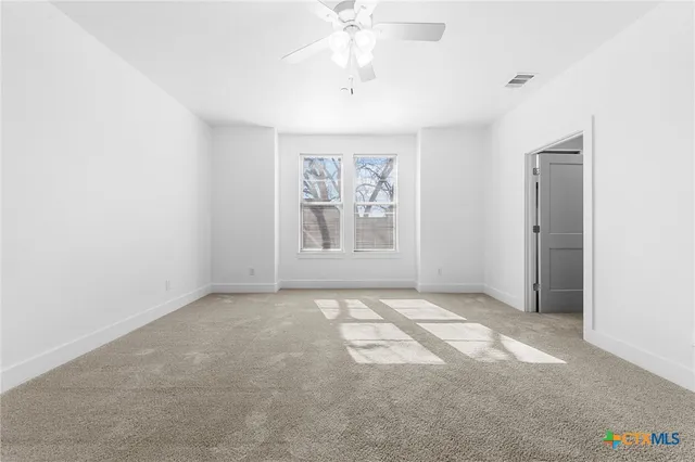 a view of an empty walk in closet
