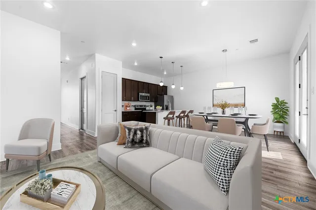 swimming pool view with a outdoor seating