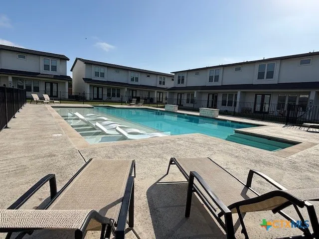 a view of a house with a swimming pool