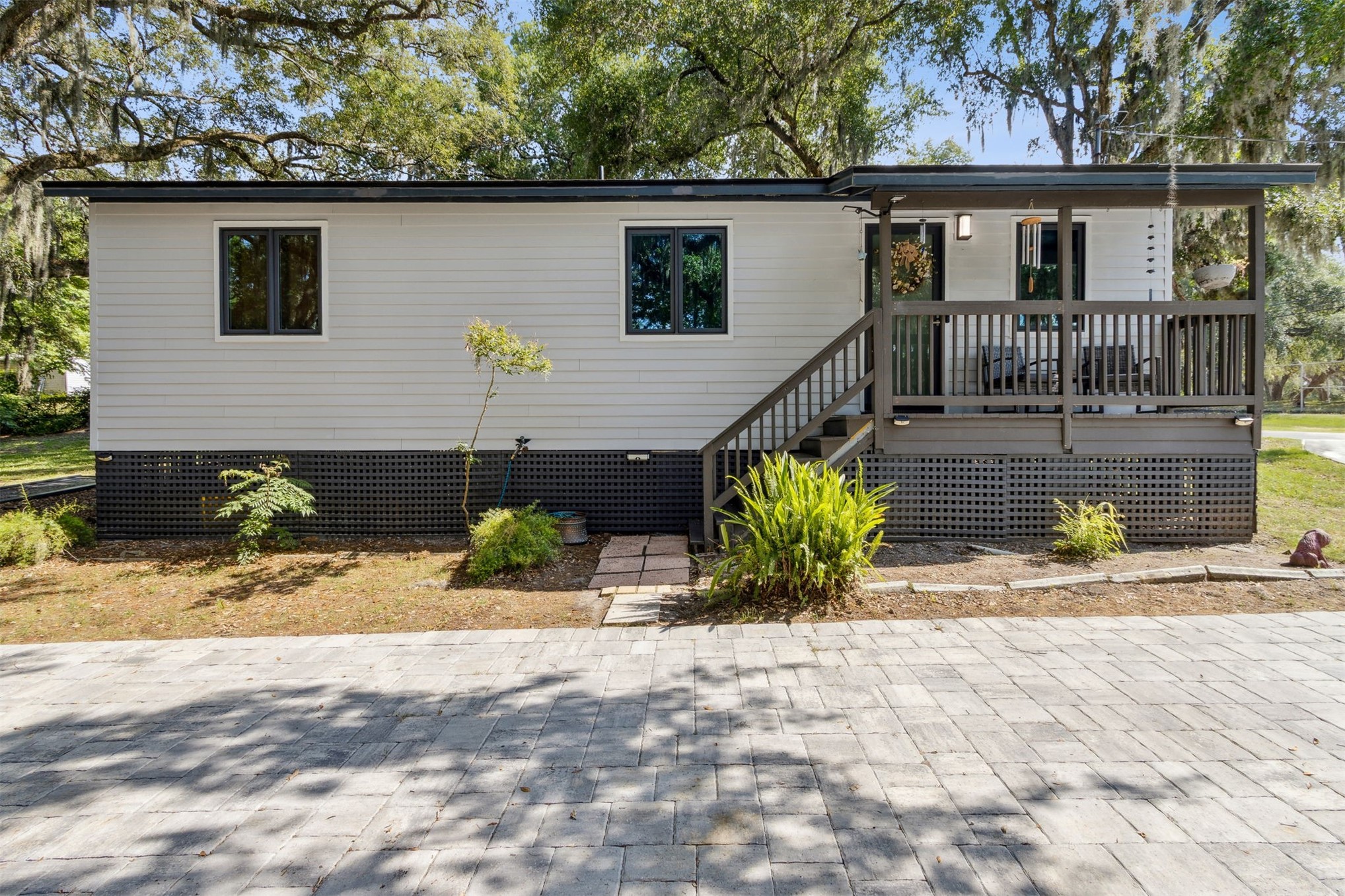 724 North 14th Street Fernandina Beach, FL 32034 - Photo 1 of 34 a view of a house with a wooden floor