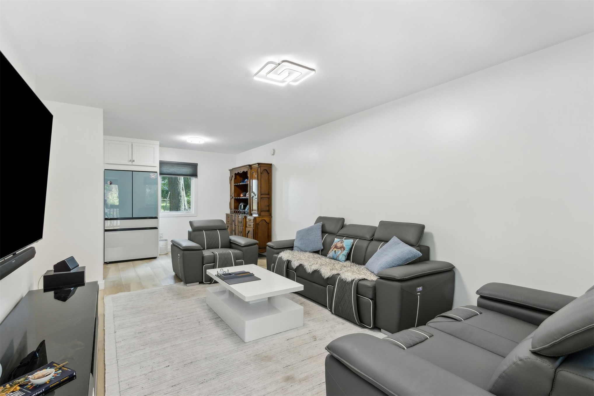 724 North 14th Street Fernandina Beach, FL 32034 - Photo 11 of 34 a living room with furniture and a flat screen tv