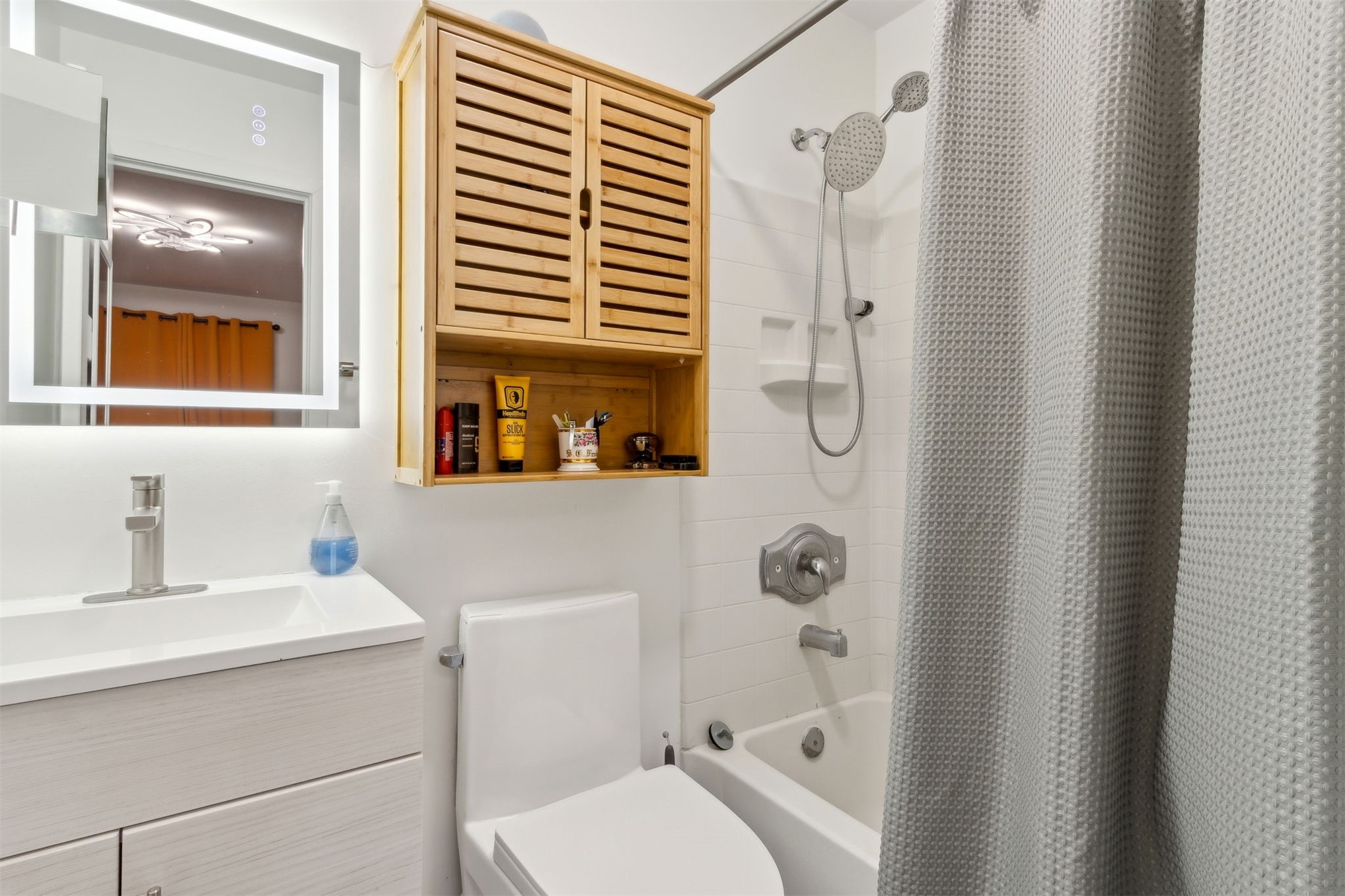 724 North 14th Street Fernandina Beach, FL 32034 - Photo 20 of 34 a bathroom with a granite countertop sink toilet and shower