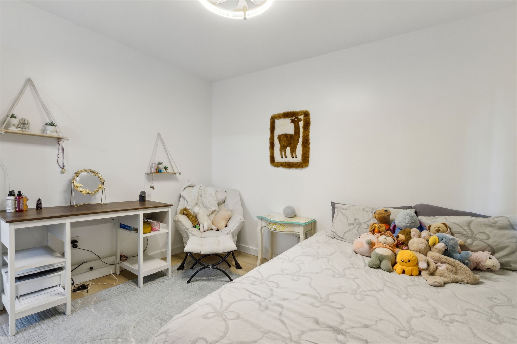 724 North 14th Street Fernandina Beach, FL 32034 - Photo 21 of 34 a bed room with a bed and a chair